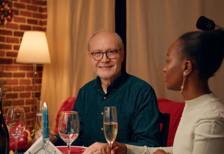 An older gentleman having a dinner