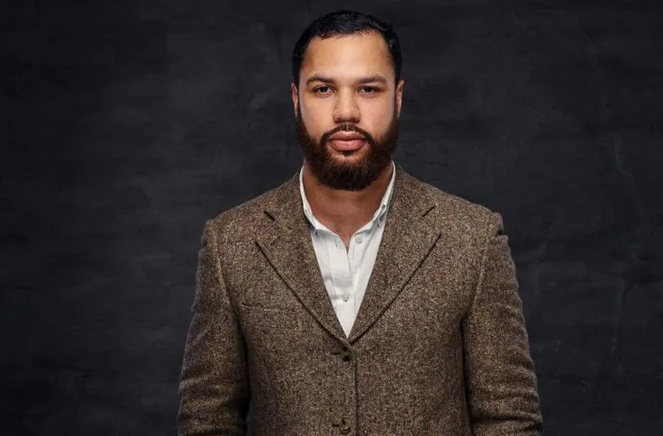 A man wearing a blazer casual look 