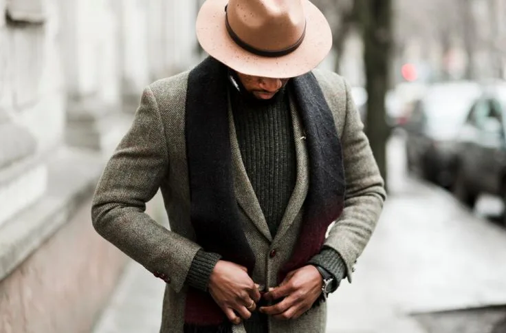 A man layers his blazer for the winter 