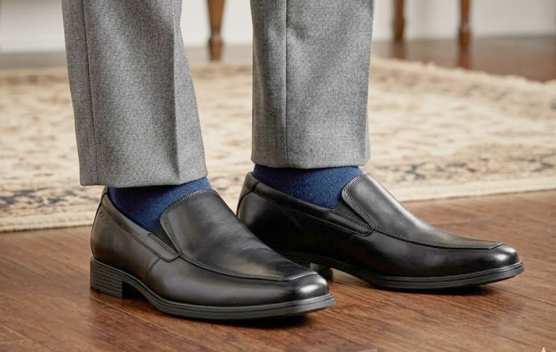 A 60s man wearing a Clarks Men's Tilden Free Slip-On Loafer