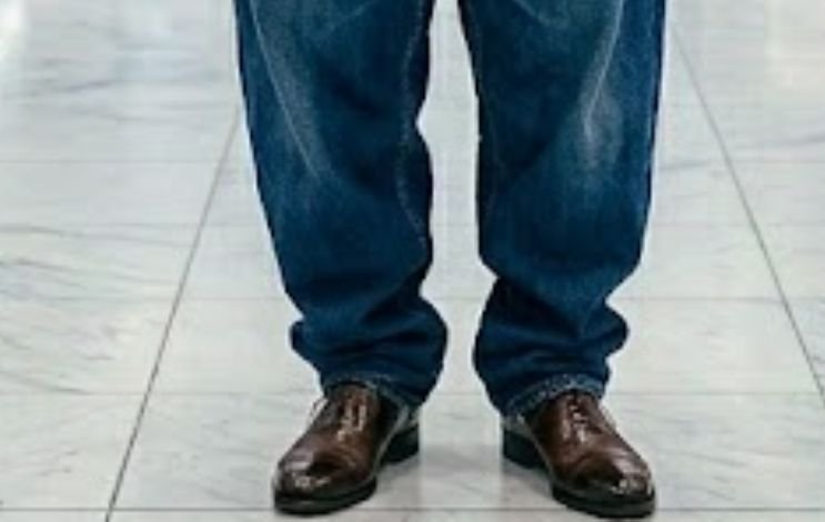 A senior man wearing inappropriate shoe