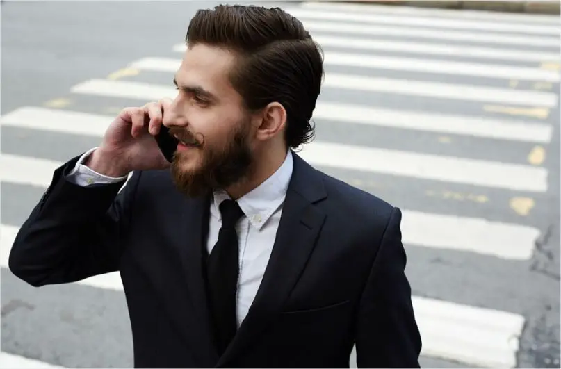 A man observing phone etiquette for men