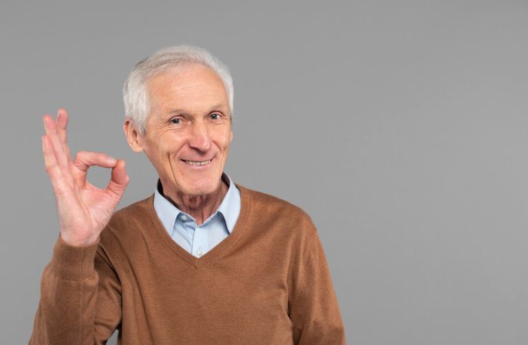 An older man in his 60s dressing appropriately