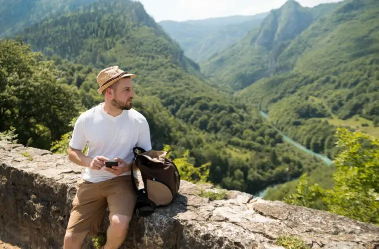 A man engaging in cheap outdoor hobby
