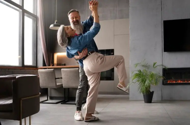 A man dancing with a woman