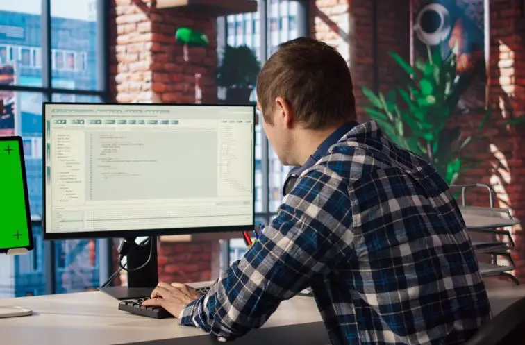 A man who uses coding and blogging as hobby at home