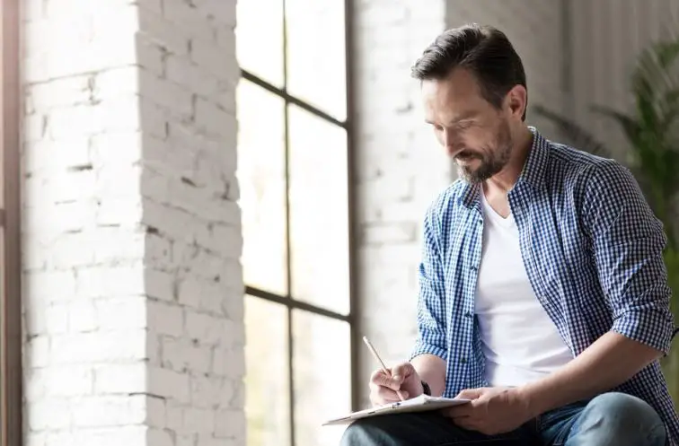 A man in his 40s writing as a hobby