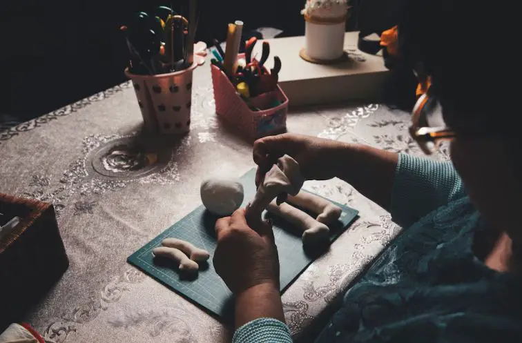 A man doing sculpture as a hobby