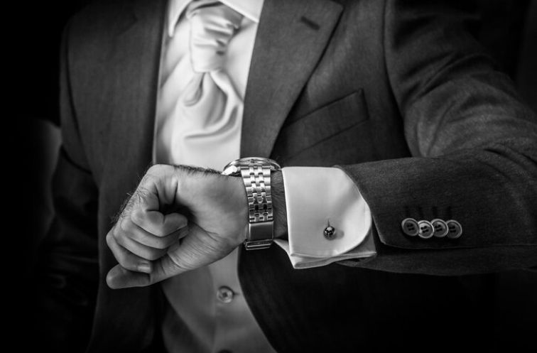 A gentleman reading a watch - Watch etiquette
