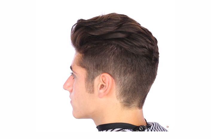 A young man gets the disconnected undercut