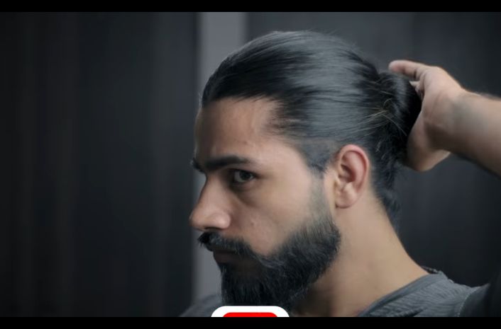 Men's man bun hairstyle