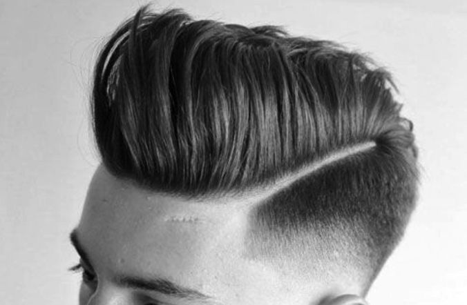 A typical Side Part Pompadour with Taper Fade
