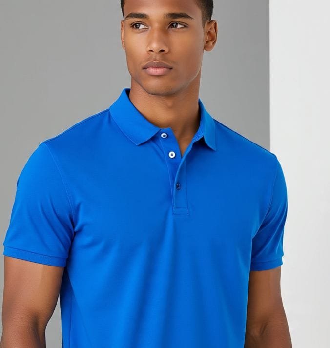 A man wearing a blue polo shirt