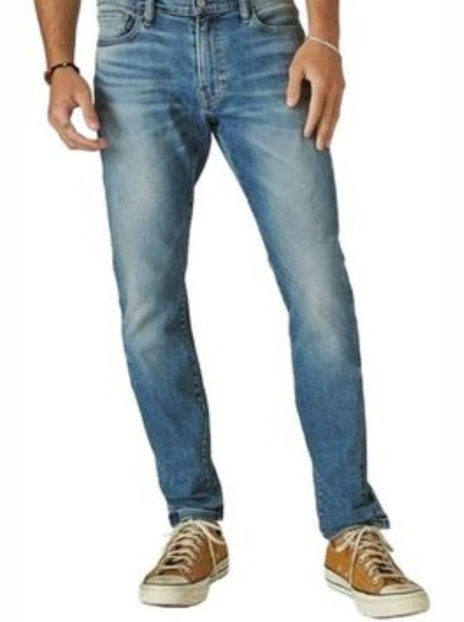 A man in men's athletic fit jeans