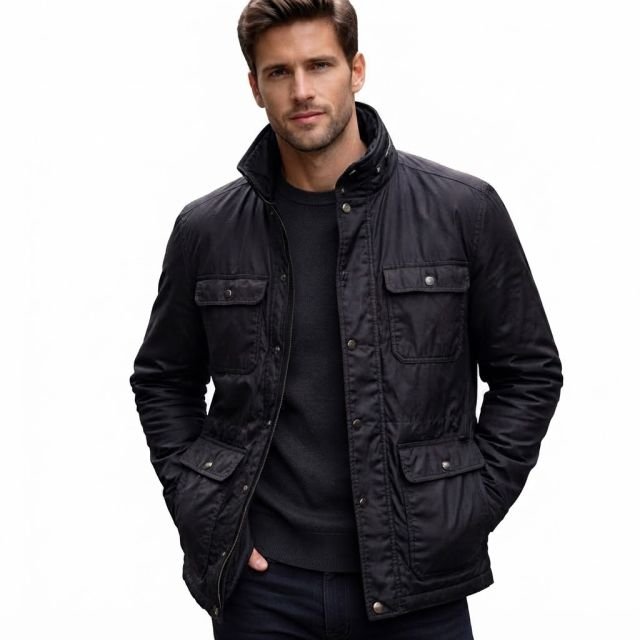 A man wearing a coach jacket
