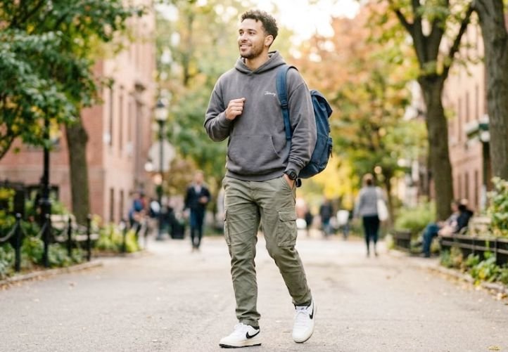 A man wearing the streetwear - Hoodie + Cargo Pants + Sneakers (Everyday Casual Look)