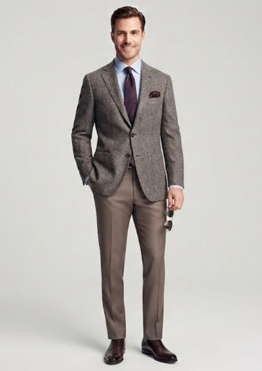A wedding guest putting on a Textured Blazer With Dress Trousers