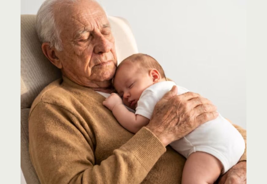 A first time grandfather with his grandkid