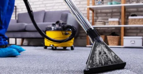 A gentleman at home cleaning