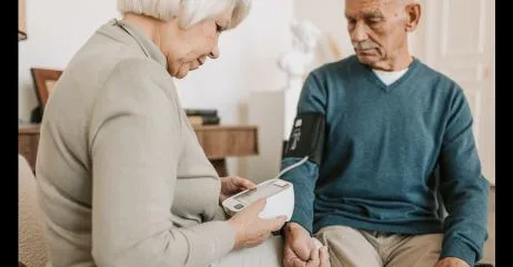 An older man being given the gift of health care