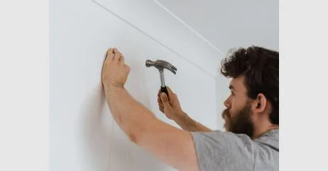 A handy man doing his work to demonstrate chivalry in modern society