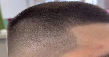 Military crew cut fade sported by a military man