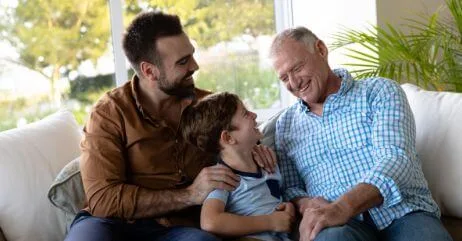 Man and two sons at home